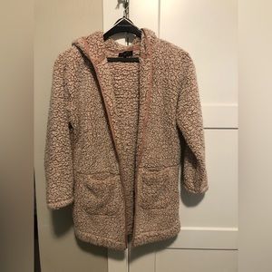 Pink fluffy coat with hood